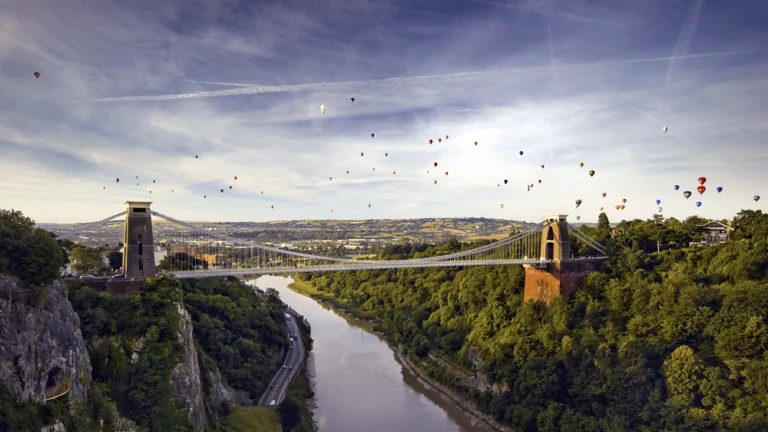 Clifton suspension bridge with hot air balloons in background